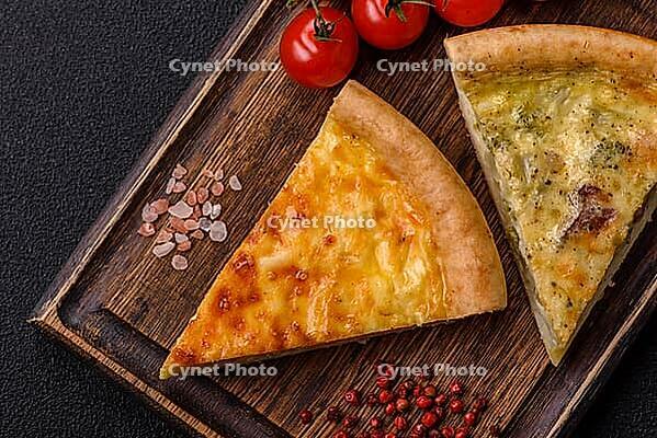 Food, Delicious quiche with broccoli, chicken or salmon and cheese with salt and spices on a dark concrete background [IBR124773757]
