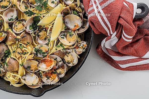 Traditional italian seafood pasta with clams Spaghetti alle Vongole [IBR124817859]