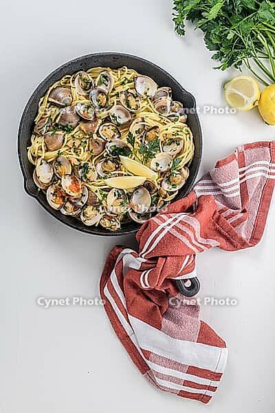 Traditional italian seafood pasta with clams Spaghetti alle Vongole [IBR124817886]