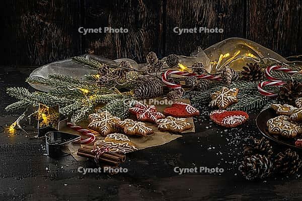 Baked Christmas cookies on rustic dark background [IBR124817909]
