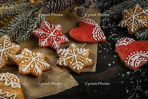 Baked Christmas cookies on rustic dark background [IBR124817910]