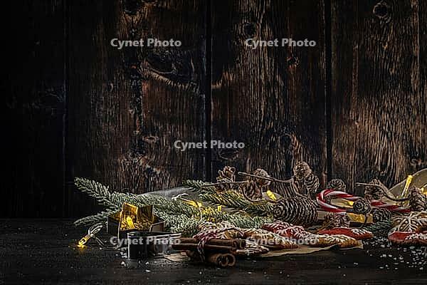 Baked Christmas cookies on rustic dark background [IBR124817911]