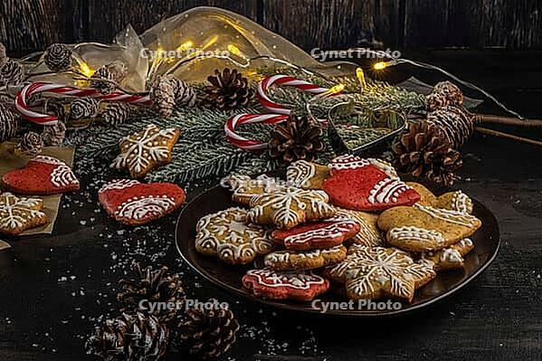 Baked Christmas cookies on rustic dark background [IBR124817922]