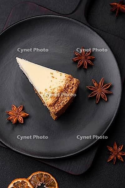 Food, Delicious sweet cheesecake cake on textured concrete background. Delicious breakfast dessert [IBR124842015]