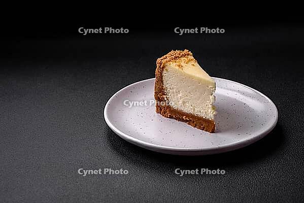 Food, Delicious sweet cheesecake cake on textured concrete background. Delicious breakfast dessert [IBR124842020]