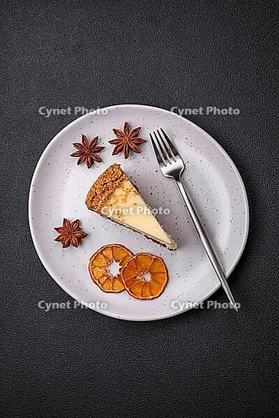 Food, Delicious sweet cheesecake cake on textured concrete background. Delicious breakfast dessert [IBR124842022]
