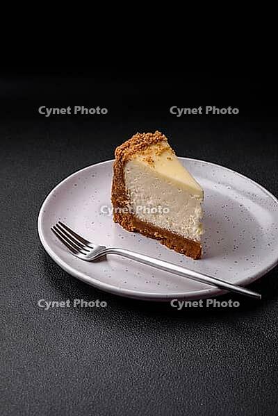 Food, Delicious sweet cheesecake cake on textured concrete background. Delicious breakfast dessert [IBR124842023]