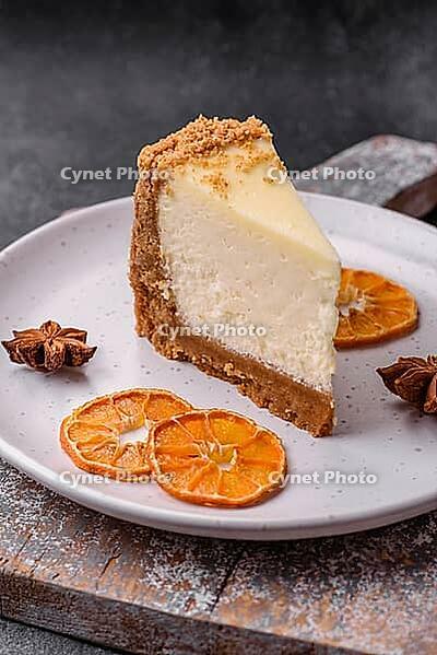 Food, Delicious sweet cheesecake cake on textured concrete background. Delicious breakfast dessert [IBR124842026]