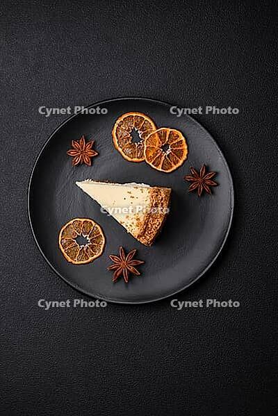 Food, Delicious sweet cheesecake cake on textured concrete background. Delicious breakfast dessert [IBR124842029]