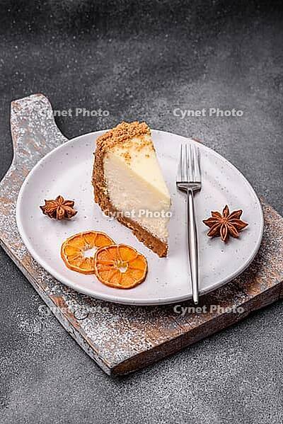 Food, Delicious sweet cheesecake cake on textured concrete background. Delicious breakfast dessert [IBR124842041]