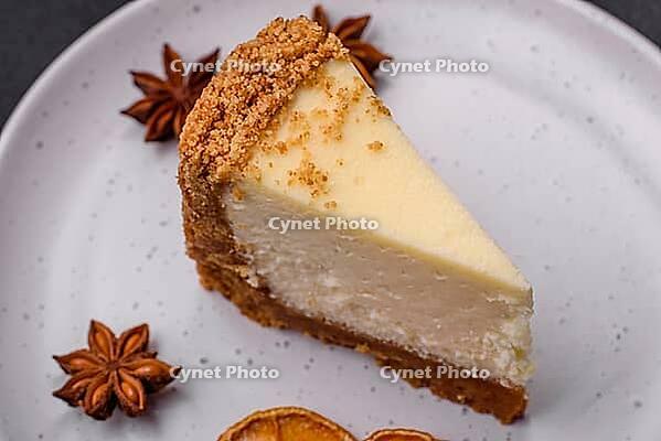 Food, Delicious sweet cheesecake cake on textured concrete background. Delicious breakfast dessert [IBR124842045]
