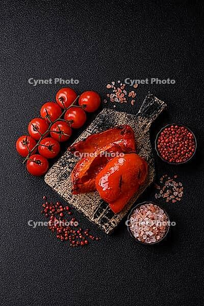 Grilled red bell peppers, vegetarian food. Red bell peppers as a food background for your design [IBR124865277]