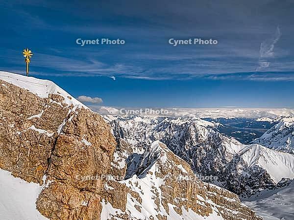 Summit cross on the Zugspitze, the highest mountain in Germany [IBR124898941]