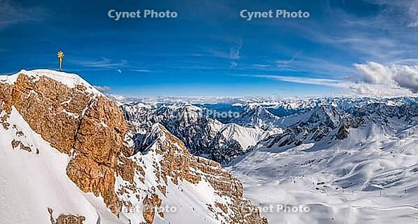 Summit cross on the Zugspitze, the highest mountain in Germany [IBR124898943]
