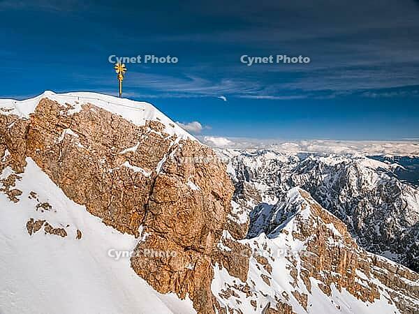 Summit cross on the Zugspitze, the highest mountain in Germany [IBR124898970]