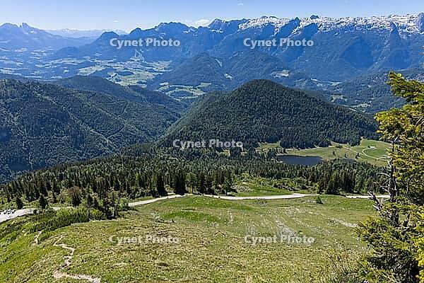 Landscape panorama, summit cross, mountains, lake, hikers, alpine pastures, Tennengau, relaxation [IBR124899490]