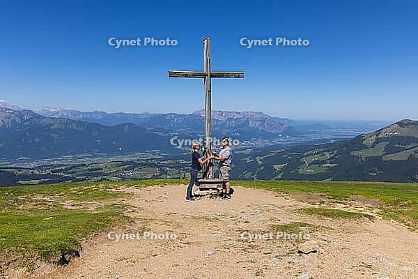 Landscape panorama, summit cross, mountains, hikers, Tennengau, relaxation [IBR124899494]