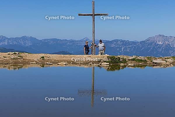 Landscape panorama, summit cross, mountains, lake, hiker, reflection, Tennengau, relaxation [IBR124899496]