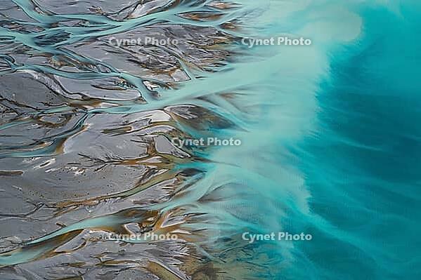 Aerial view from above of the Gelscher river courses on the edge of Lake Pukaki, New Zealand [IBR124899546]