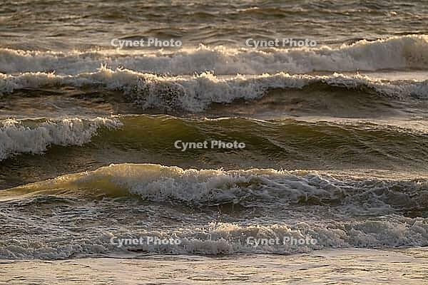 Surf, breaking waves with spray against light, Sortebærdalen Strand, Houvig, North Sea, Denmark [IBR124899880]
