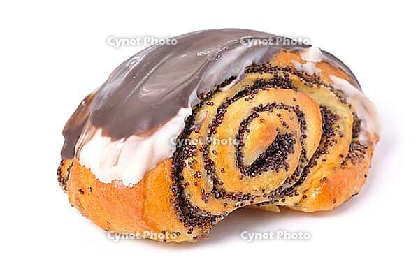 Pie with poppyseed iced with chocolate isolated on white [IBR124906355]