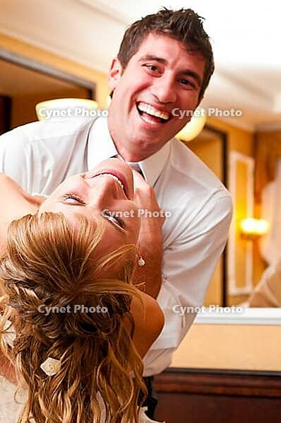 Funny wedding dance of bride and groom [IBR124906377]