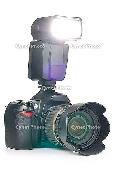Photo camera with an external flash installed [IBR124906403]