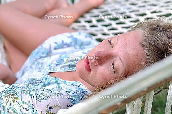 Sexy woman in hammock [IBR124906436]