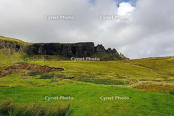 View of the Scottish Highlands, green meadows and cloudy skies in summer 2018 [IBR124915224]