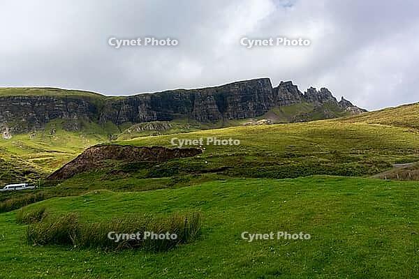 View of the Scottish Highlands, green meadows and cloudy skies in summer 2018 [IBR124915227]
