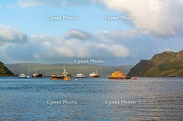 View of a bay with boats, near Portree in summer 2018 [IBR124915233]