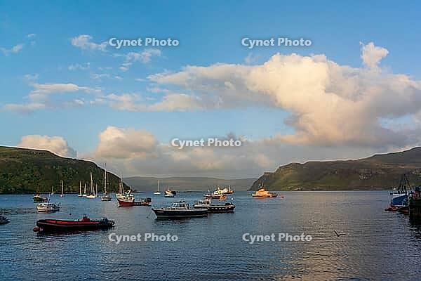 View of a bay with boats, near Portree in summer 2018 [IBR124915236]