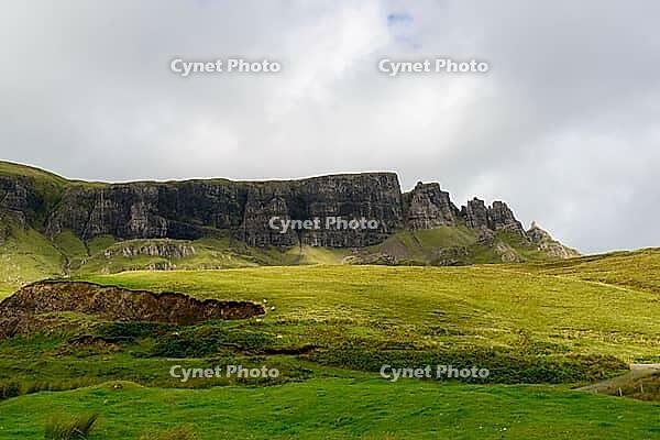 View of the Scottish Highlands, green meadows and cloudy skies in summer 2018 [IBR124915241]