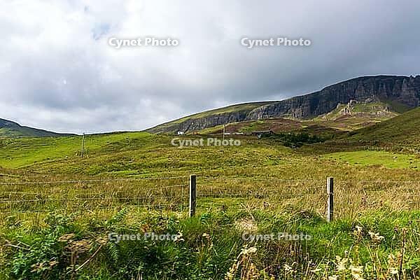 View of the Scottish Highlands, green meadows and cloudy skies in summer 2018 [IBR124915242]