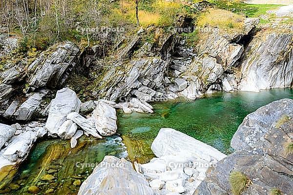 View of a creek surrounded by rocks [IBR124915250]