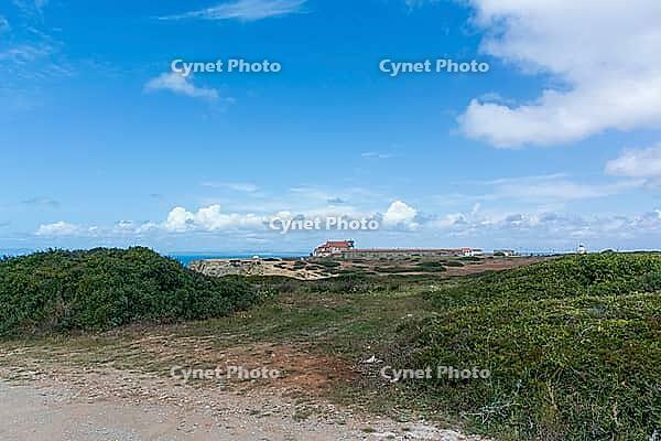 View of an old building on the Atlantic coast under a slightly cloudy sky, near Setubal in spring 2019 [IBR124915265]