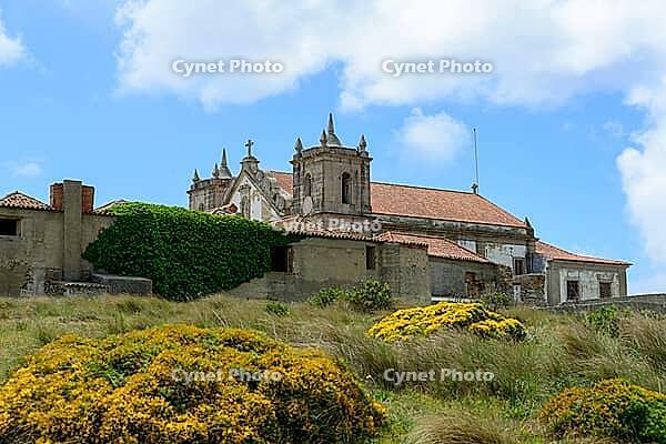 View of an old building on the Atlantic coast under a slightly cloudy sky, near Setubal in spring 2019 [IBR124915266]