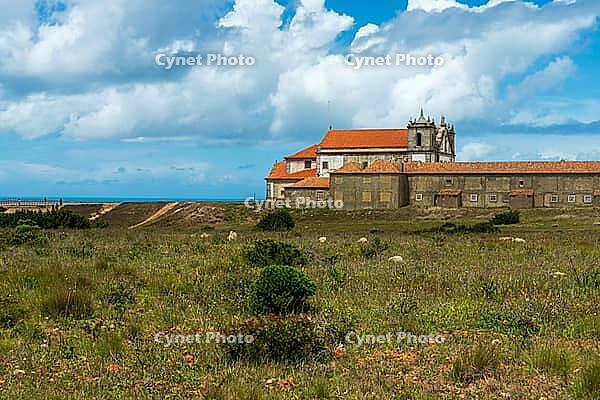 View of an old building on the Atlantic coast under a slightly cloudy sky, near Setubal in spring 2019 [IBR124915268]