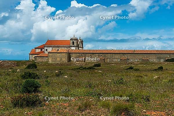 View of an old building on the Atlantic coast under a slightly cloudy sky, near Setubal in spring 2019 [IBR124915269]