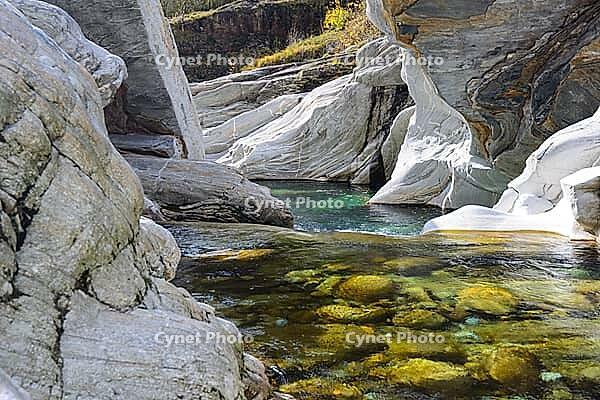 View of a creek surrounded by rocks [IBR124915284]