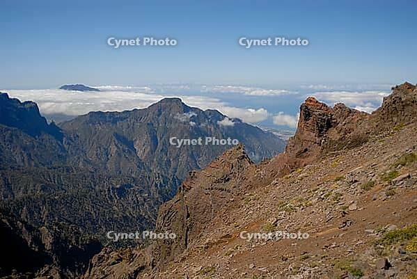 Mountains in the day with view over the clouds [IBR124915301]
