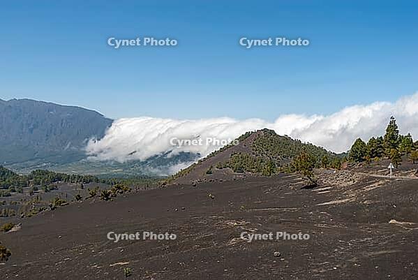 Mountain range with cloud-shrouded peaks [IBR124915303]
