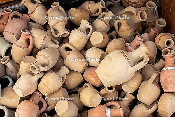 A pile of handcrafted clay pots reveals earthy tones and timeless craftsmanship from Cappadocia's pottery heritage [IBR124920161]