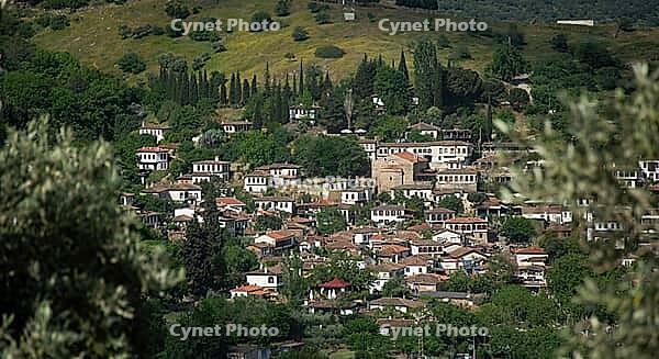 A panoramic view of the historic hillside village of Sirince with traditional white Ottoman houses [IBR124920164]