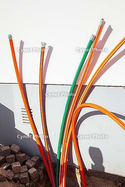 Construction site for laying fiber optic cables in front of a residential building, Bremen, Germany [IBR124920247]
