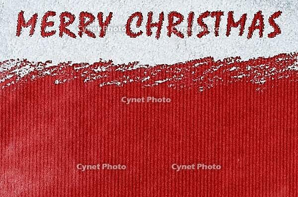 Merry christmas handwritten on snow and red craft paper [IBR124944053]