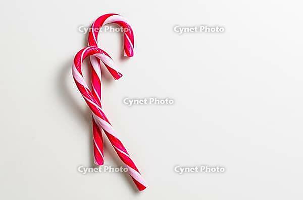 Two candy cones on gray background [IBR124944054]