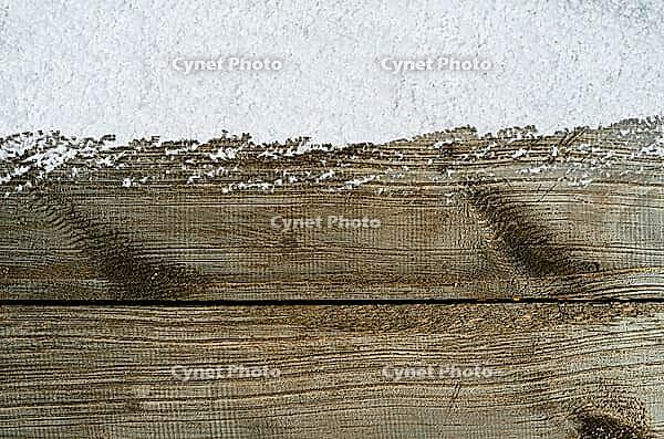 Christmas card or new year background made of snow and wooden table [IBR124944095]