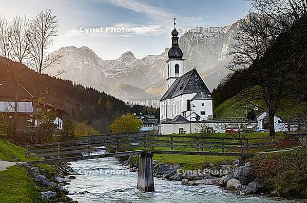 Autumn view of St. Sebastian parish church against Reiter Aple, Bavaria, Germany [IBR124944102]