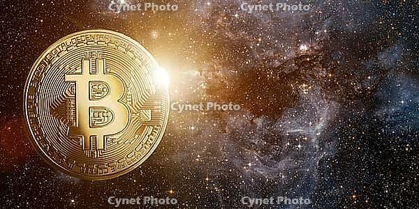 Bitcoin with rising sun behind, in starry space. Elements of this image furnished by NASA [IBR124944108]